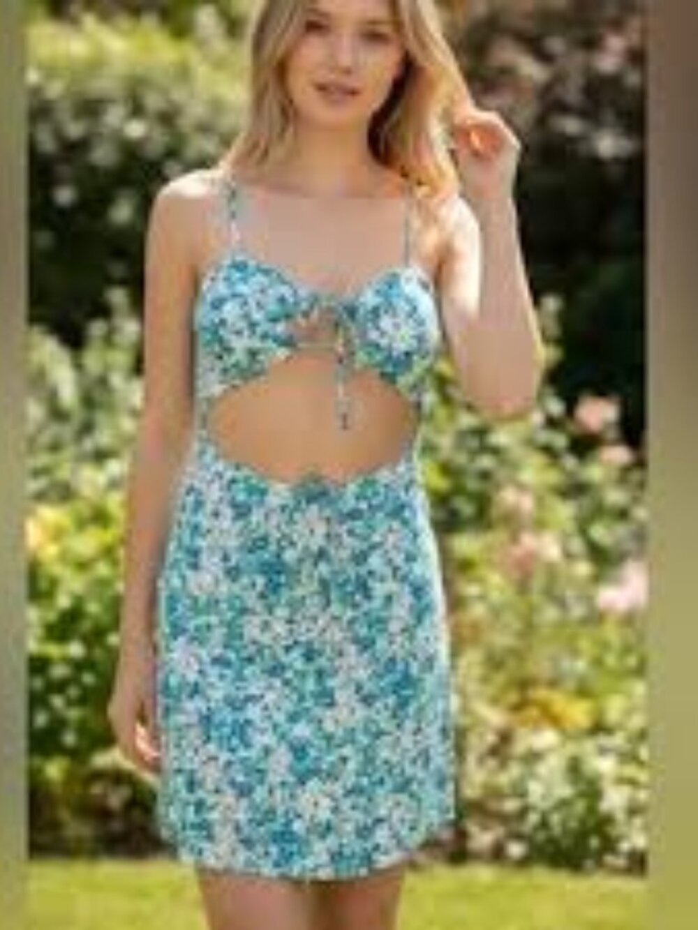 Sky to Moon Floral Cut-Out Mini Dress. New without Tags. Size: M. Ask: $50.
